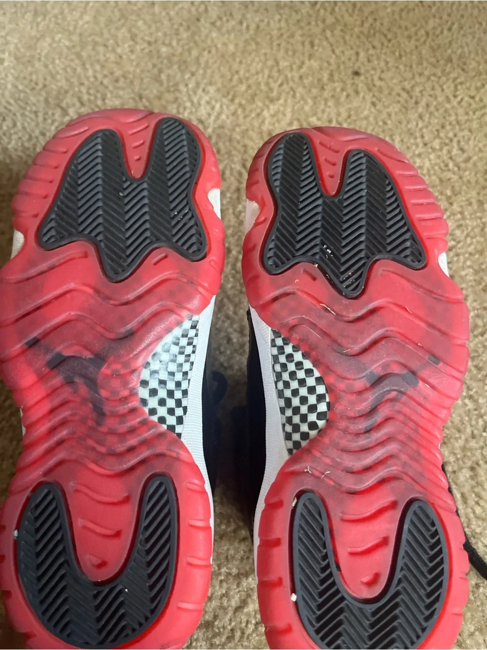 Nike Kids Black Sneakers with Red Soles